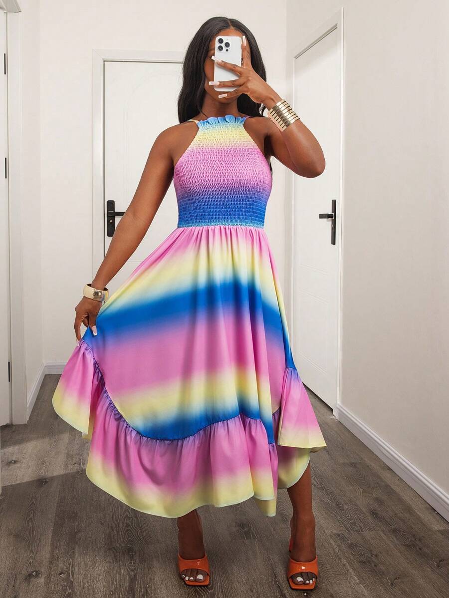 Make a bold statement with this captivating ombre flounce halter neck dress, your go-to piece for summer elegance. Featuring a striking multicolor striped design, this bohemian-inspired dress showcases a backless silhouette with delicate ruffles and shirring details that add texture and movement. The high-waisted A-line cut with flared midi hem flatters every body type, while the halter neckline creates a sophisticated focal point. Constructed from a breathable 95% polyester and 5% elastane blend with sligh