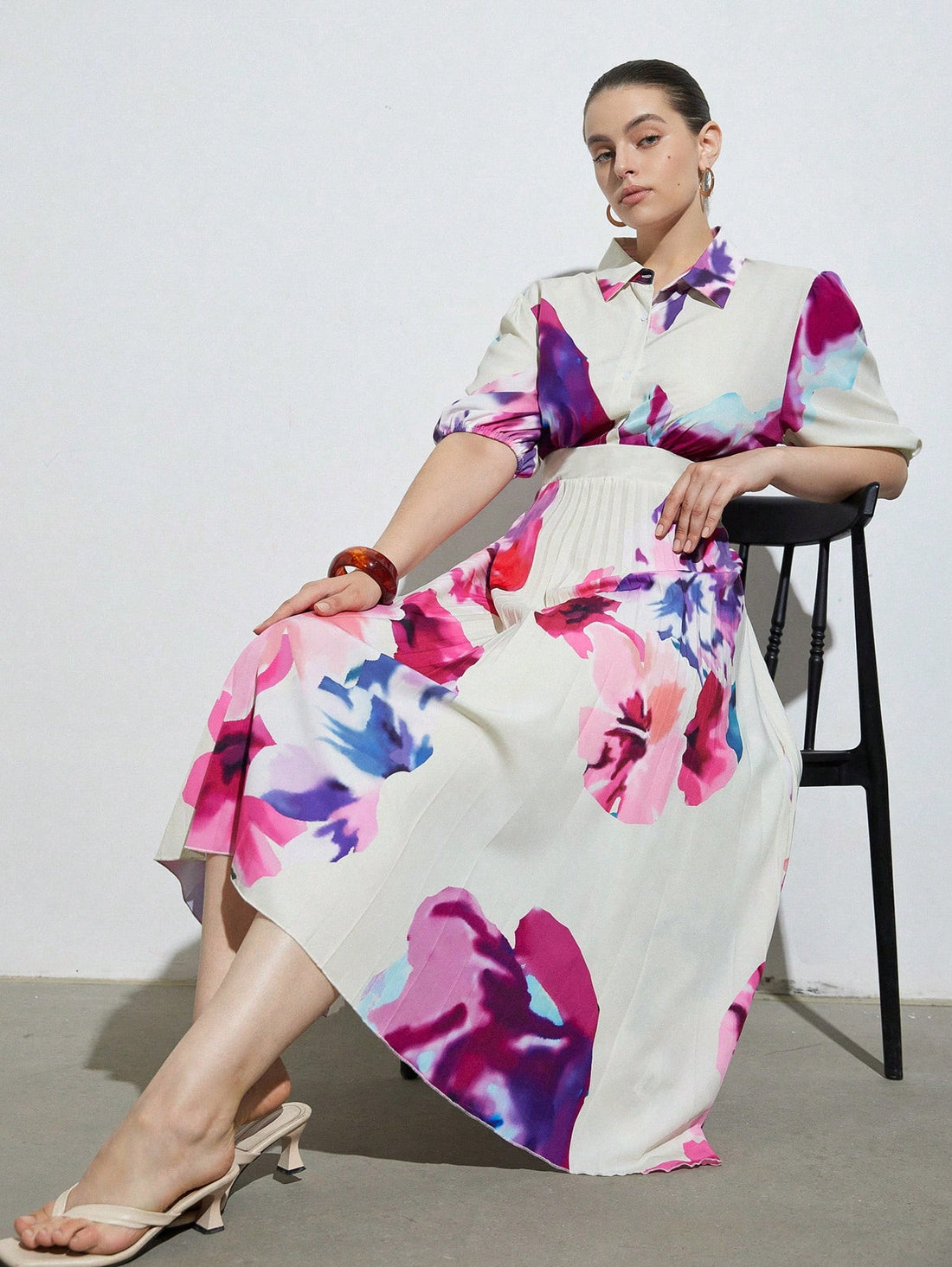 Step into timeless charm with this Romantic Vintage Plus Size Shirt Dress. Featuring a full print design, a classic collar, and an elasticized waist, it beautifully hugs your curves while the flared skirt adds a playful twirl to every step. Perfect for those who love vintage vibes with a fun, flattering fit.