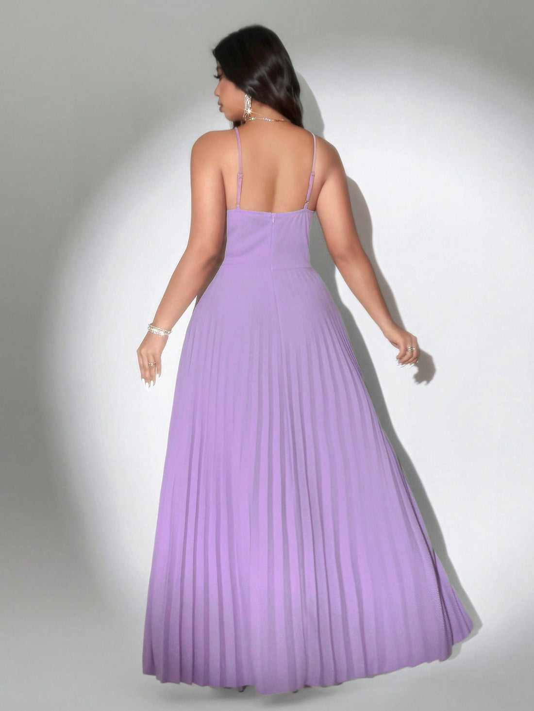 Step into the spotlight with this Elegant Plus Size Women’s Pleated Formal Gown! Its flowing pleats add a touch of romance and movement, perfect for twirling at parties or special events. Designed to flatter your curves while keeping comfort in mind, this gown makes every celebration feel like a fairytale. Get ready to dance the night away in style and confidence!
