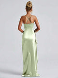 Light-blue satin gown front view with crossed-back straps and glossy finish