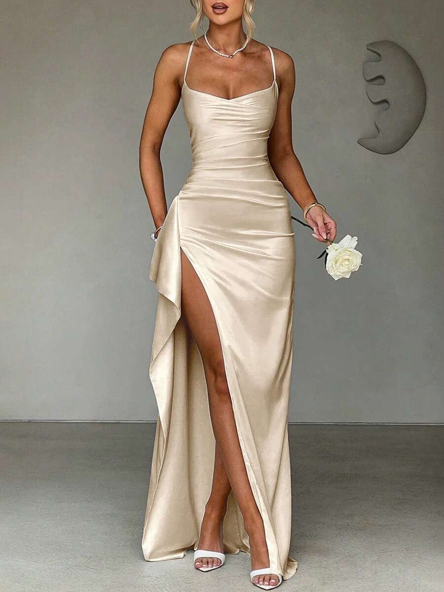 Brown satin gown back view with crossed straps and long skirt