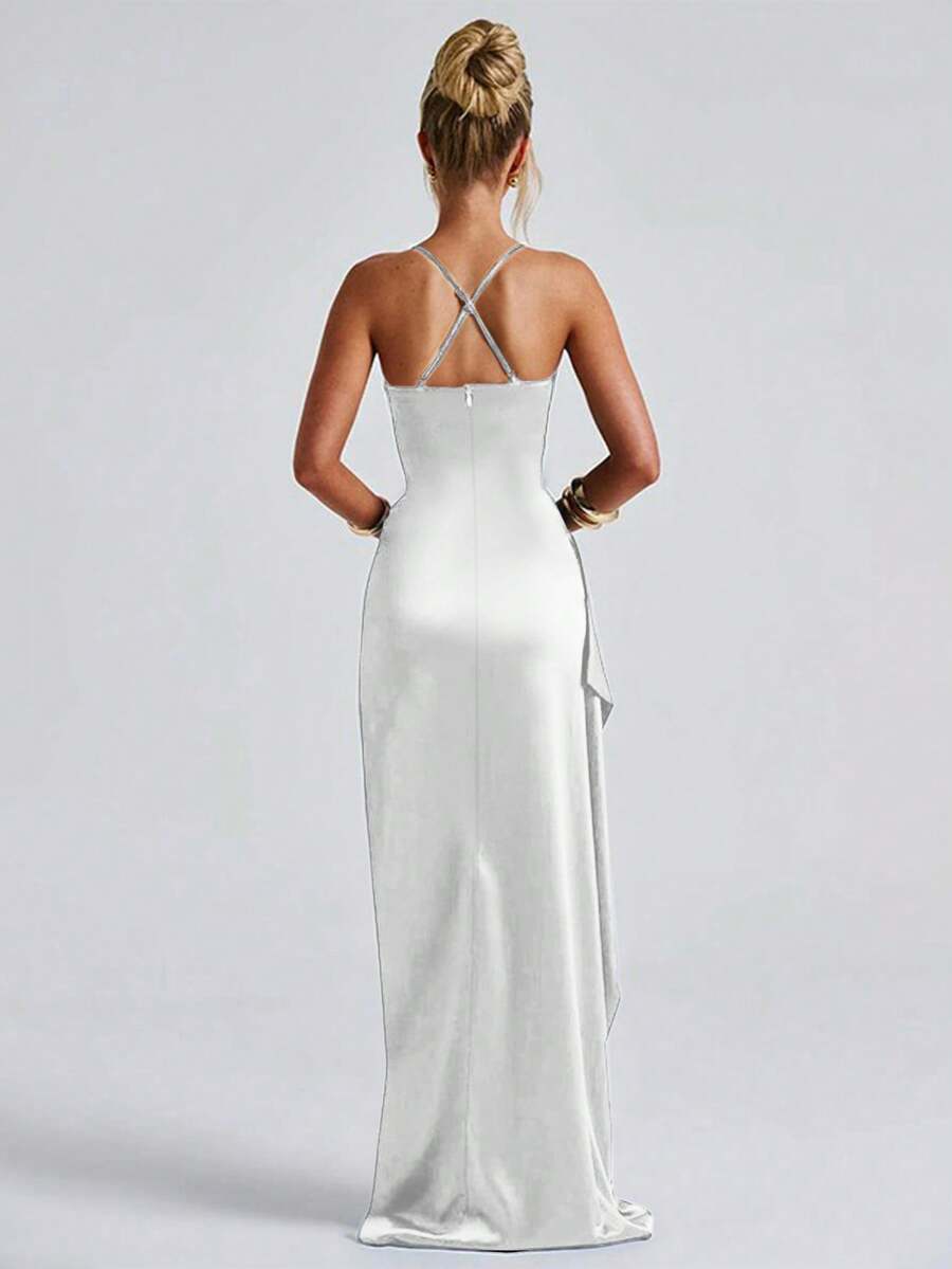 White satin gown front view with narrow straps, side drape and high slit