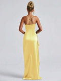 Yellow-gold satin gown back view with crossed straps and floor-length hem