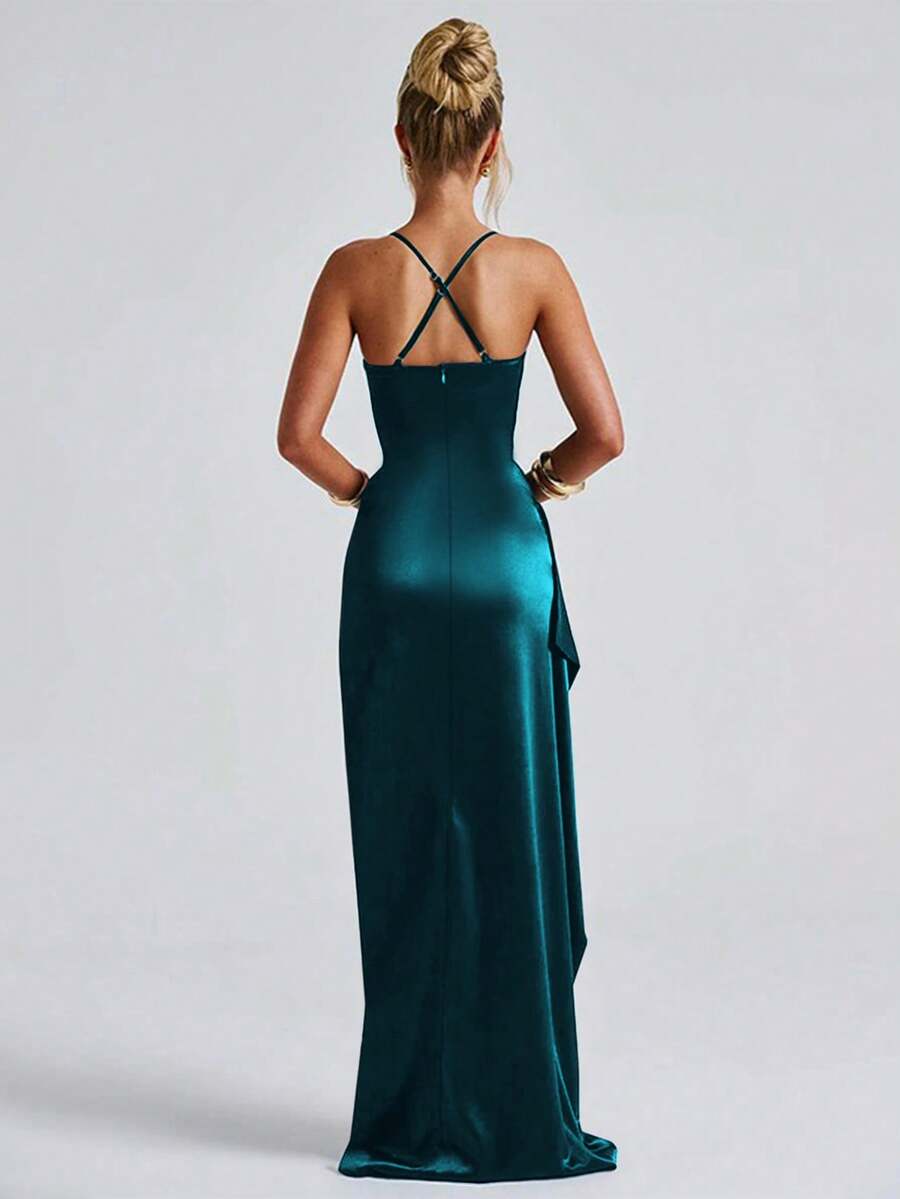 Teal satin gown back view with crossed straps and full-length hem