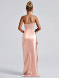 Blush-pink satin gown back view showing crossed straps and long skirt