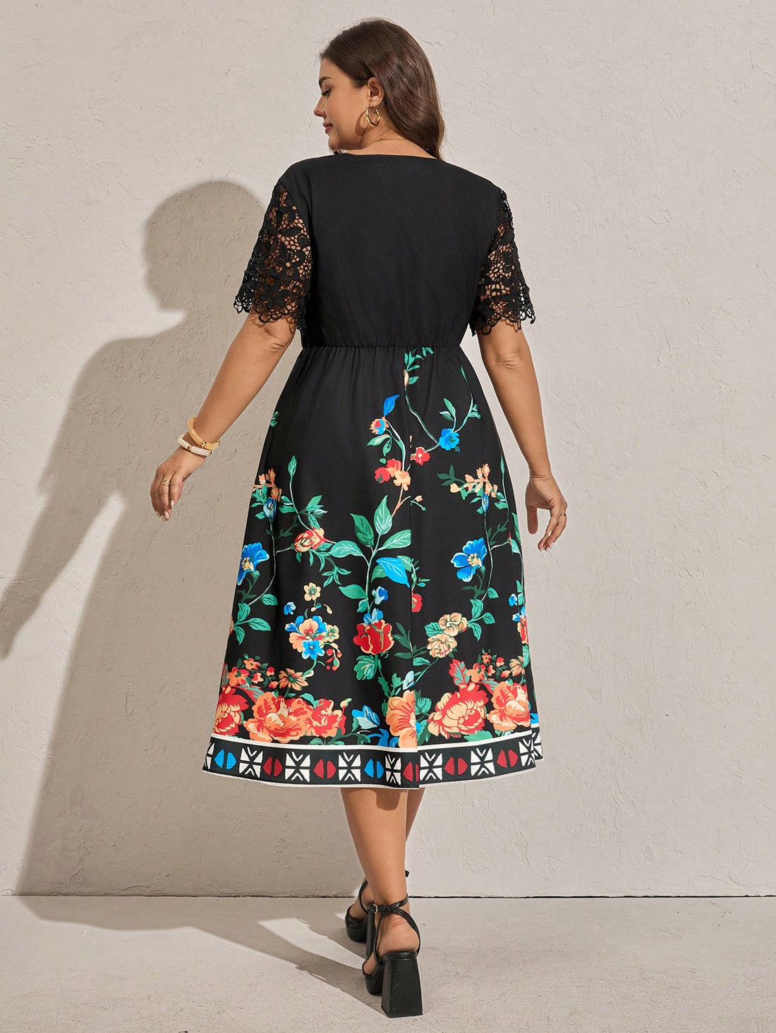 Celebrate sunny days in style with this plus size floral print lace dress. Its short sleeves and delicate lace detail add a flirty, feminine touch while the vibrant floral pattern brings summer vibes to life. Designed for comfort and confidence, this dress is perfect for garden parties, brunches, or any occasion where you want to shine with playful elegance.