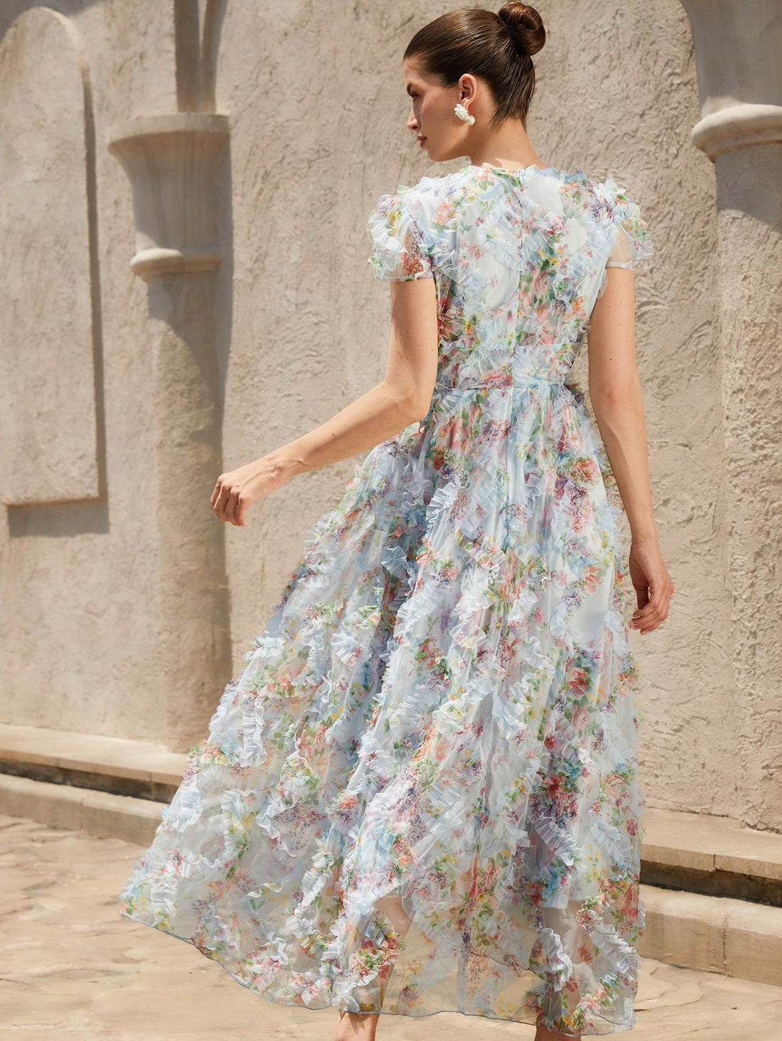 Step into sunshine and style with this Elegant V-Neck Floral Chiffon Maxi Dress. Lightweight and breezy, it flows effortlessly with every step, making it your go-to beach companion for summer holidays. The playful floral pattern paired with a flattering V-neck adds a touch of charm and confidence, perfect for warm days and balmy evenings. Embrace the carefree vibe while staying chic and comfortable all season long!