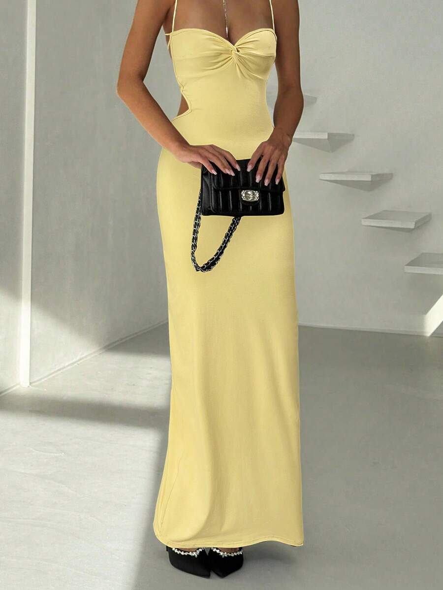 Turn heads at your next summer celebration in this chic cami dress that perfectly blends style and sass. The daring side cut-outs add an edgy twist, while the cinched waist creates a flattering silhouette that moves with you. Whether you're dancing at a festival or sipping cocktails at a rooftop party, this dress delivers effortless glamour with just the right amount of flirtation. Lightweight and breathable, it's your go-to piece for making a statement when the temperature rises.