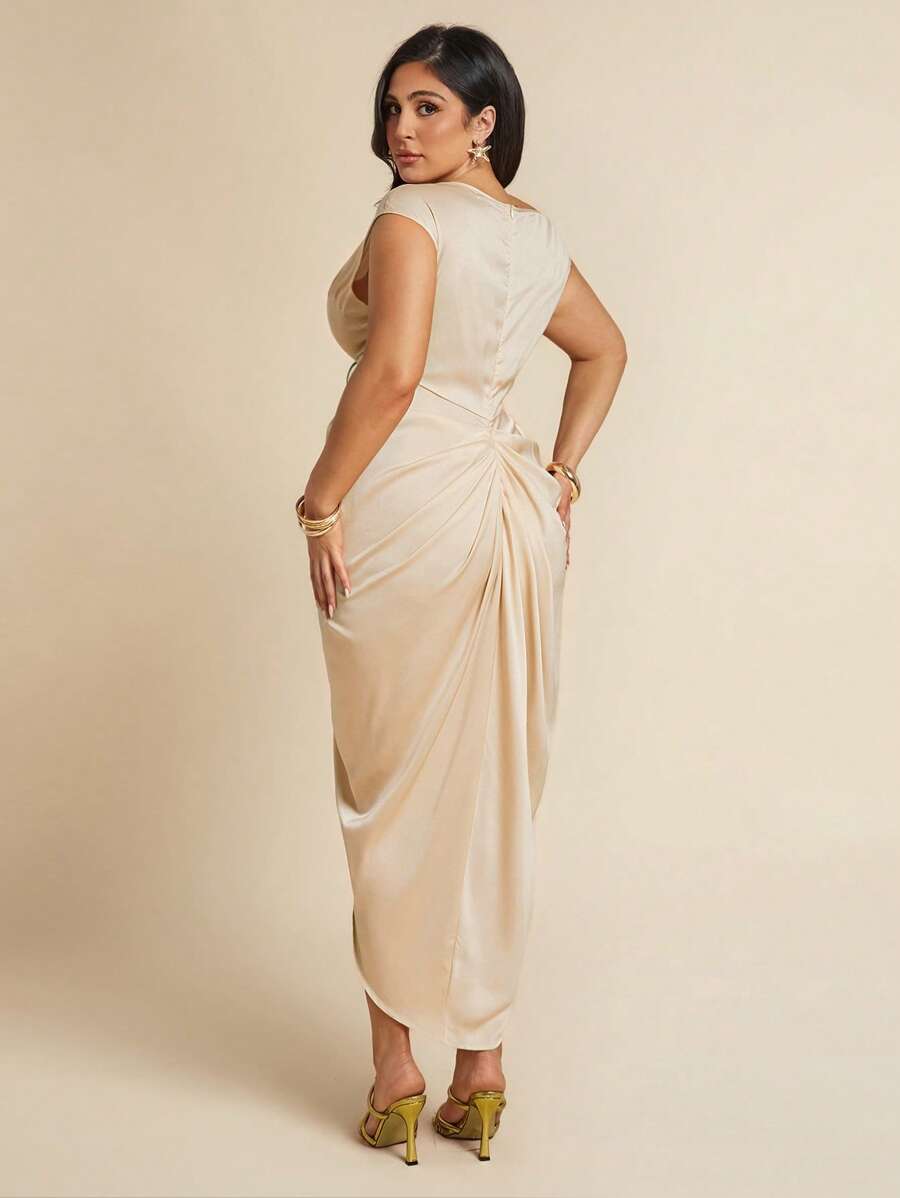 Slip into this elegant plus size black satin maxi dress and let its asymmetric design add a flirty twist to your look. Perfect for romantic evenings or breezy beach vacations, the smooth satin fabric feels as dreamy as it looks. Embrace effortless glamour with a dress that moves with you, making every moment feel special and playful.