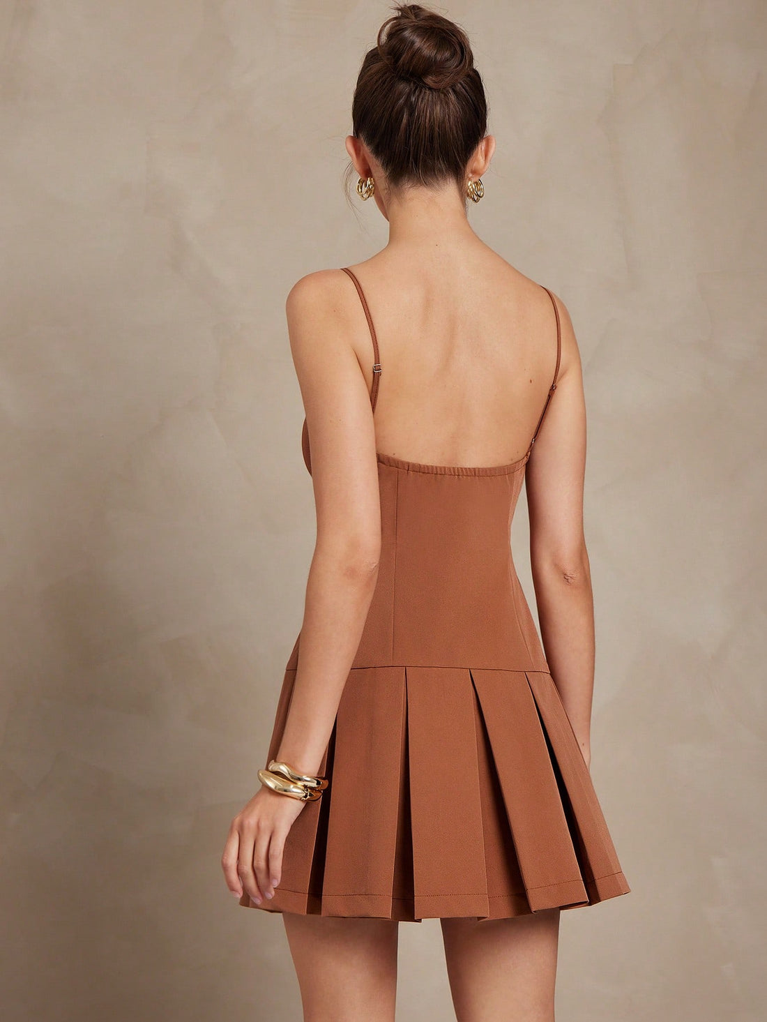 Step into the boardroom or brunch in style with this Chic A-Line Pleated Mini Dress. Its timeless pleats and classic silhouette channel that effortless old money vibe, making your office look anything but ordinary. Flirty yet polished, it’s perfect for those who like to keep it playful while staying sharp.