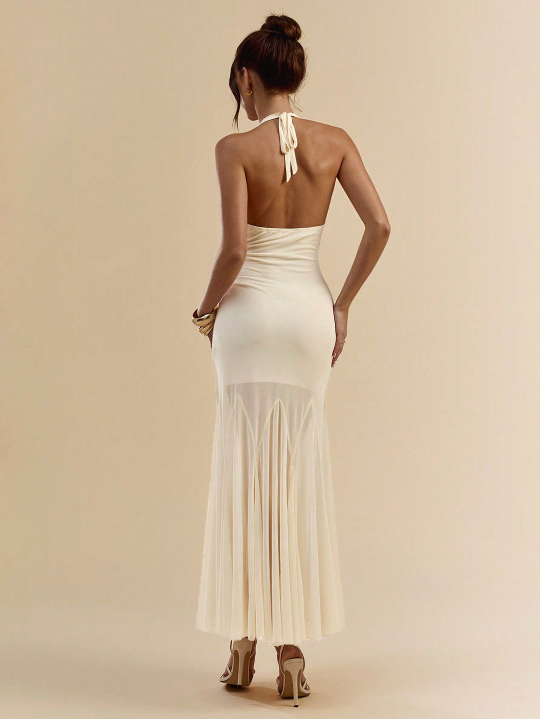 Float through summer days in our Elegant Apricot Sheer Maxi Dress! This breezy beauty features whimsical faux flower details that dance with every step. Perfect for beach adventures, sunset strolls, or sipping cocktails oceanside. The sheer fabric catches the light (and attention!) while the apricot hue complements sun-kissed skin. Your vacation wardrobe just got a whole lot more fun!