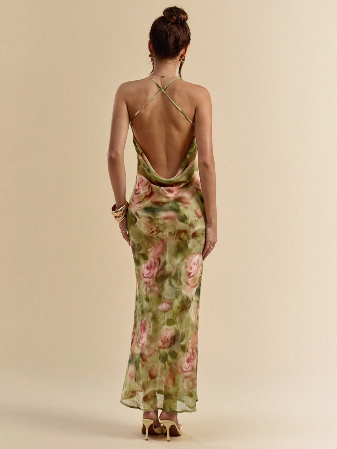 Float through your beach vacation in our tie-dye floral maxi dress! This playful piece features a flirty backless design that's ready for sunshine adventures. The elegant flowing silhouette keeps you cool while turning heads from shoreline to sunset dinner. Embrace those carefree spring and summer vibes with a dress that's as fun as your getaway plans!