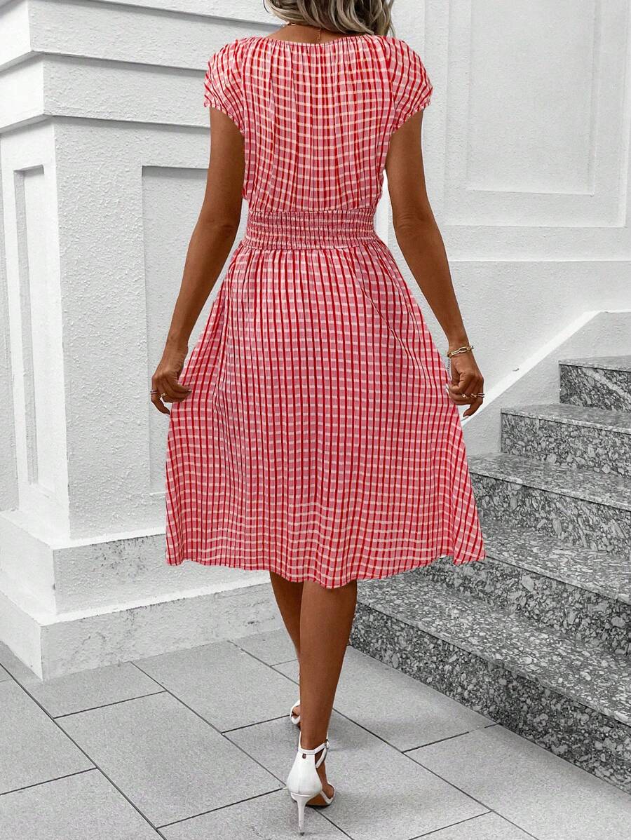 Step into summer with this playful and breezy dress! Featuring a flattering surplice neckline and stylish batwing sleeves, it’s designed to keep you cool and comfy on casual vacations. The vibrant print adds a fun pop of color, making this dress your go-to for effortless, chic days under the sun.