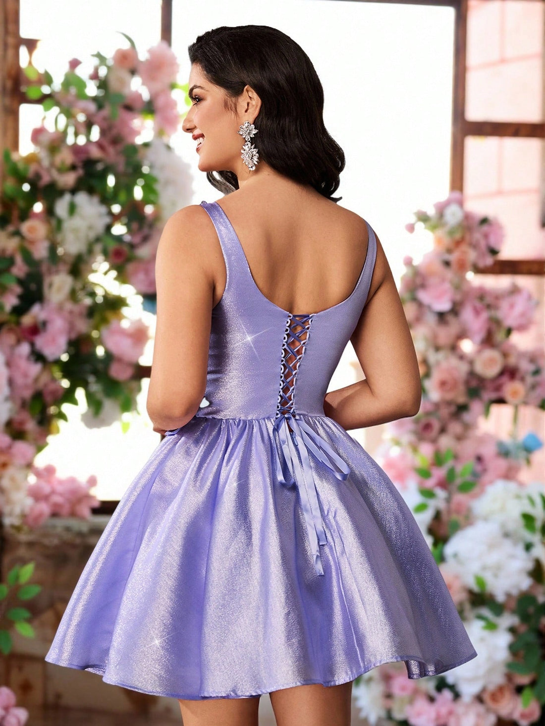 Step into the spotlight with this Elegant Purple Glitter A-Line Dress, sparkling with crystal beads and topped with a charming bow. Perfect for weddings, parties, or graduations, it adds a playful touch to any celebration while keeping you comfortable and stylish all day long. Shine bright and dance the night away in this dazzling dress!