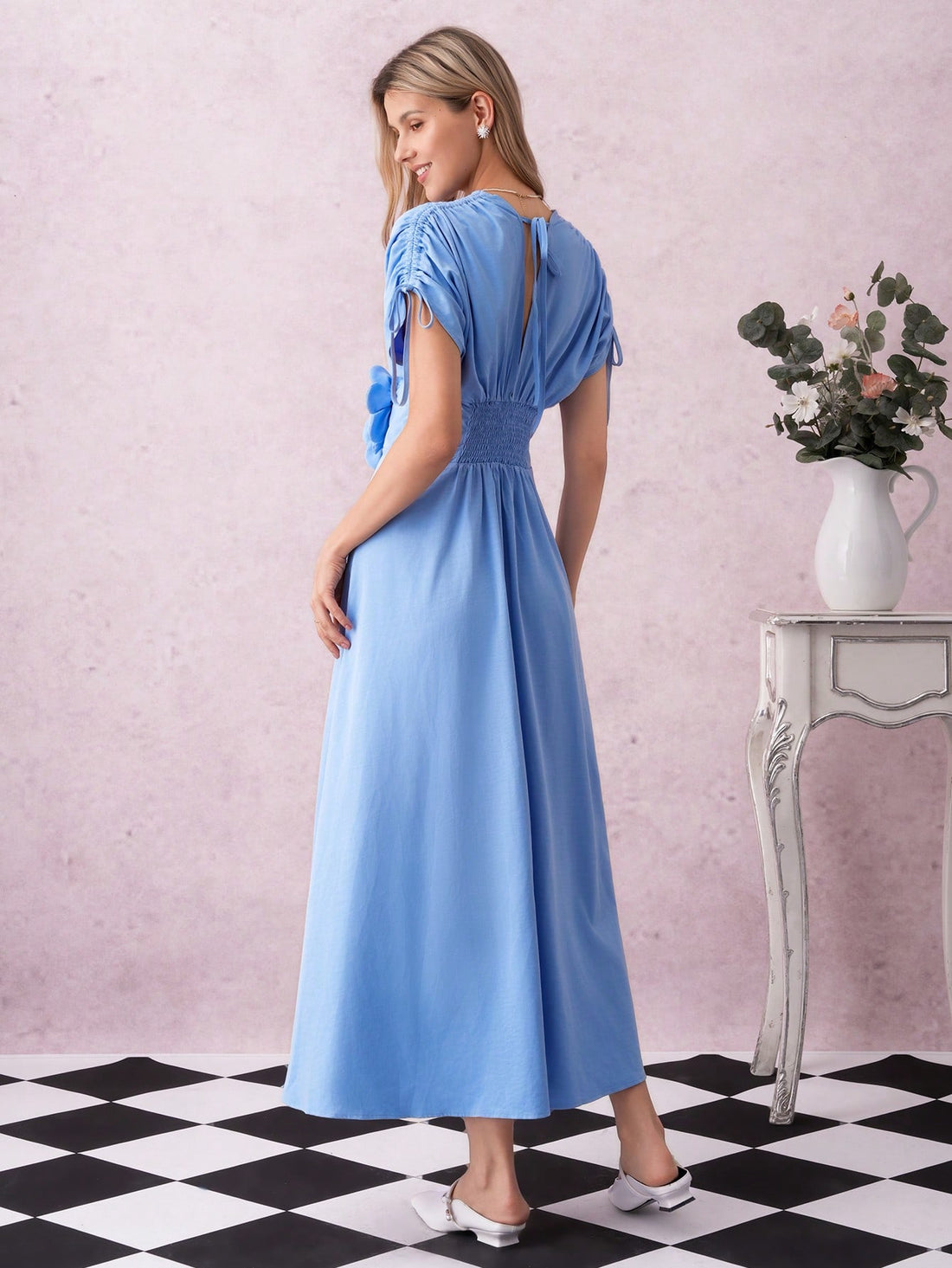 Twirl into the season in this gorgeous blue floral maxi dress that's basically a love letter to effortless elegance. The flattering V-neckline and adjustable waist tie let you customize your fit, while the charming bowknot detail adds that perfect touch of personality. Whether you're heading to holiday gatherings or just want to feel fabulous on a regular Tuesday, this dress delivers comfort and style in one swoon-worthy package. Perfect for anyone who believes getting dressed should be fun, not stressful.