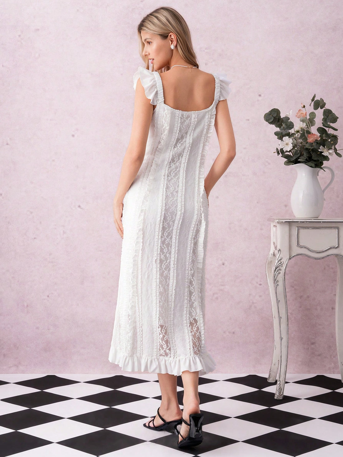 Step out in style with this Elegant Long Ruffled Strap Dress crafted from delicate lace fabric. The flowing ruffles add a flirty touch while the long silhouette ensures you turn heads at any event. Whether it’s a garden party or a romantic dinner, this dress brings effortless charm and a playful vibe to your wardrobe.