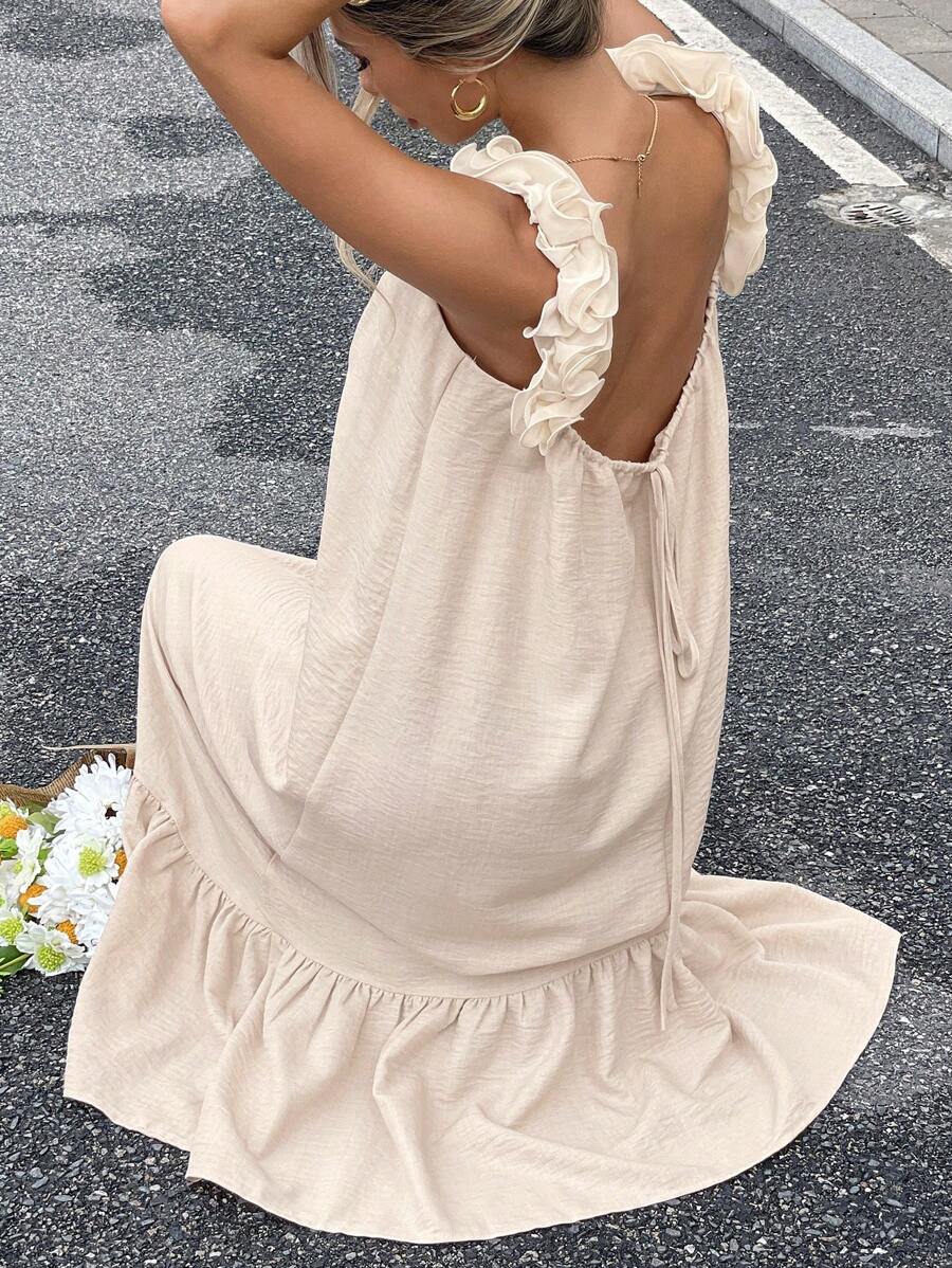 Effortless elegance meets fun in this sleeveless dress! The solid color keeps things timeless while the charming ruffle hem adds a playful twist that works year-round. Whether you're celebrating the holidays or enjoying lazy summer days, this versatile piece transitions seamlessly from casual outings to festive gatherings. Comfortable, chic, and ready for anything—your new go-to dress awaits!