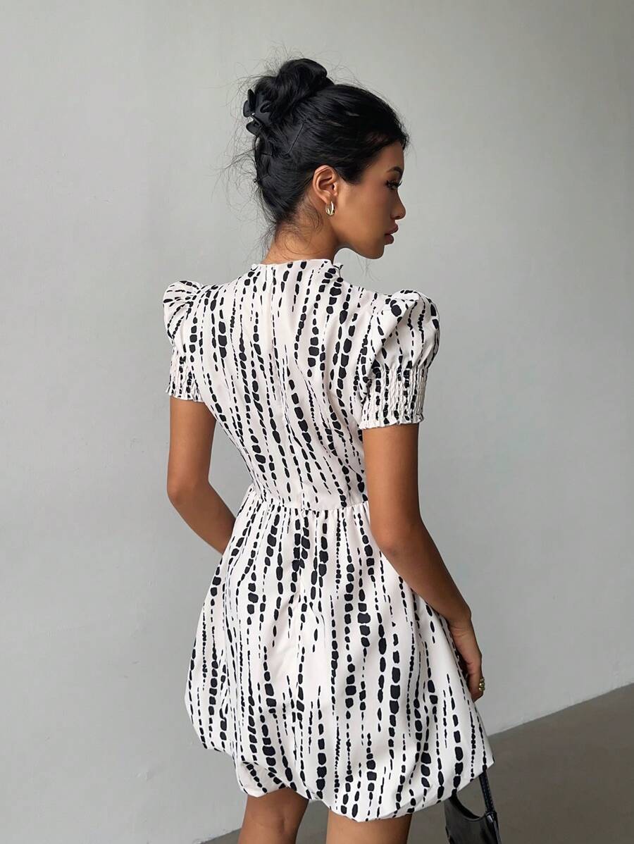 Embrace whimsical charm with this Women's Butterfly Print A-Line Dress, featuring a stand collar and adjustable drawstring waist for a perfect fit. The fluttery butterfly print adds a touch of playful elegance, while the A-line silhouette flatters every shape. Whether you're headed to brunch or a garden party, this dress keeps you comfortably stylish and ready to twirl.