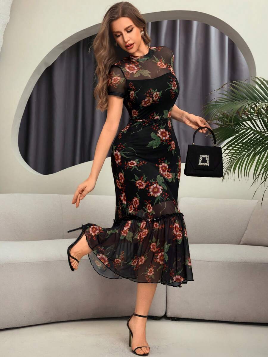 Embrace your dark romantic side with this stunning gothic floral print dress. Featuring an eye-catching wave hem that adds movement and drama, paired with a flattering cinched waist that defines your silhouette beautifully. The intricate floral patterns bring an unexpected twist to classic gothic style, making it perfect for anyone who loves to stand out with attitude and elegance. Whether you're heading to a special event or just want to turn heads on an ordinary day, this dress lets your bold personality 