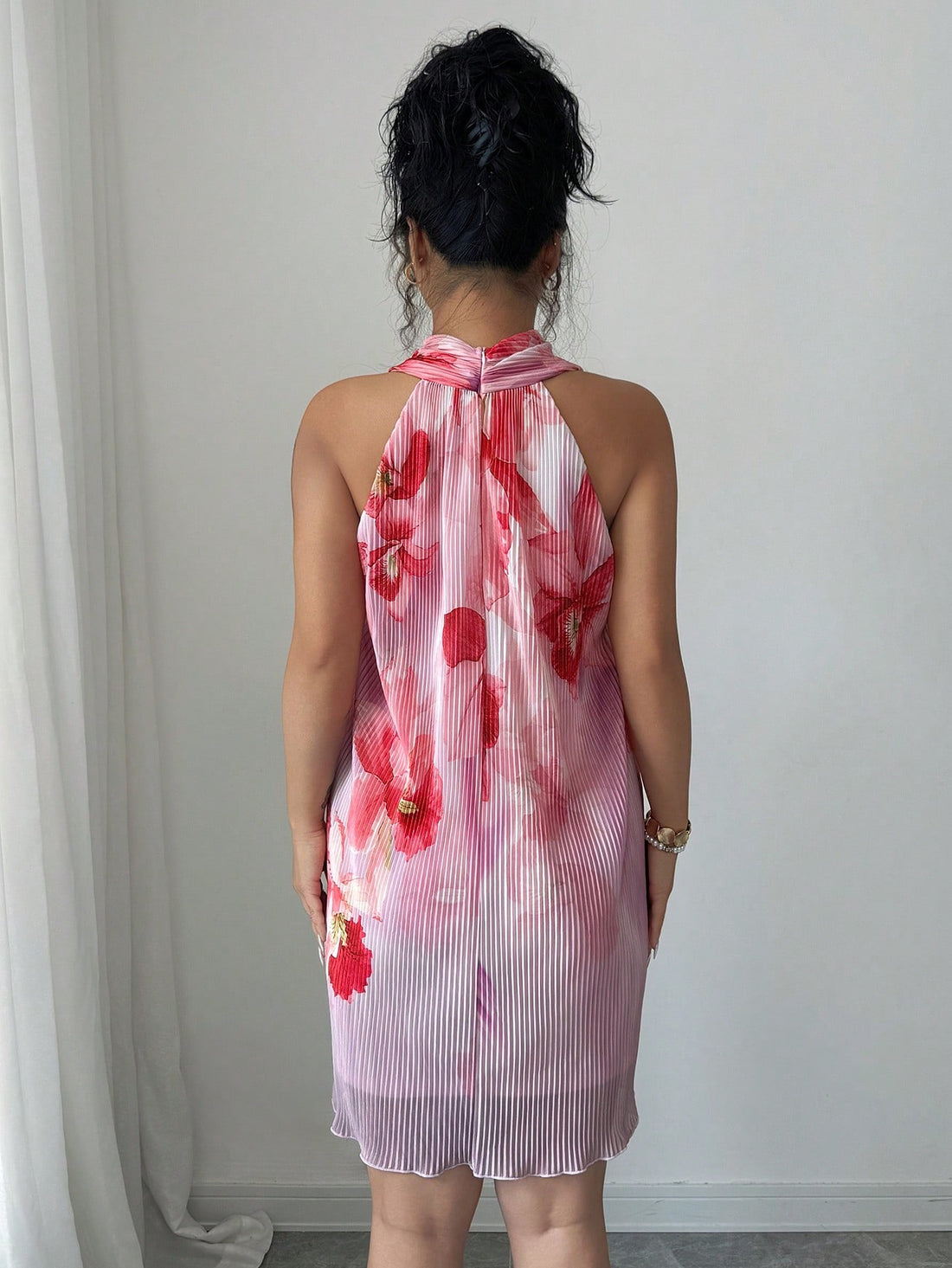 Dive into summer with this vibrant tie-dye halter beach dress that screams fun and freedom. The eye-catching print brings instant personality to your warm-weather wardrobe, while the flattering halter neckline keeps you feeling confident and chic. Perfect for beach days, poolside hangs, or casual outings, this dress transitions effortlessly from day to night. Lightweight and breezy, it's your new go-to for making a colorful splash wherever the season takes you.