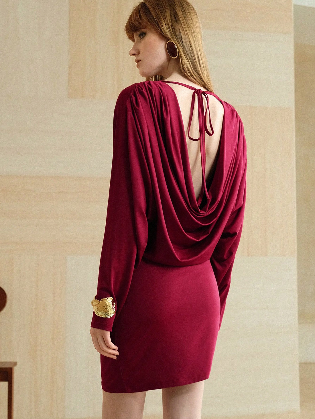 Step out in style with this chic backless long-sleeved dress featuring delicate straps for a retro street vibe. Perfect for elegant ladies who love to mix classic charm with a playful twist, this dress offers a flattering silhouette that turns heads while keeping you comfortable. Whether you're hitting the town or a casual gathering, its unique design lets you express your confident, fun-loving spirit effortlessly.