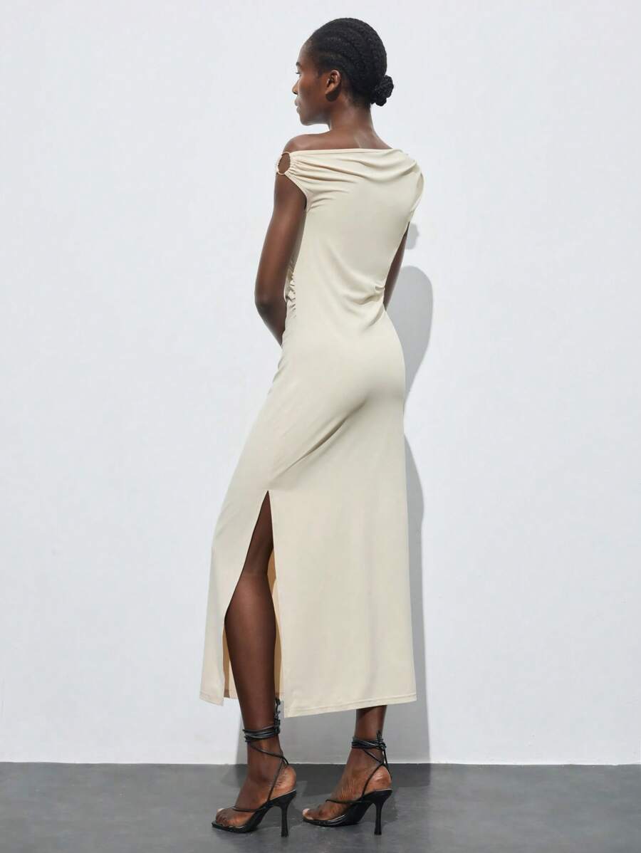 Turn heads with this playful twist on vintage Y2K style! The Elegant Asymmetric Shoulder Cut-Out Dress features a chic metal ring detail that adds just the right amount of edge. Perfect for autumn and winter, its unique cut-out design keeps your look fresh and fun whether you're jet-setting, celebrating at weddings, or dancing through parties. Embrace a bold, stylish vibe that’s effortless to wear and impossible to forget.