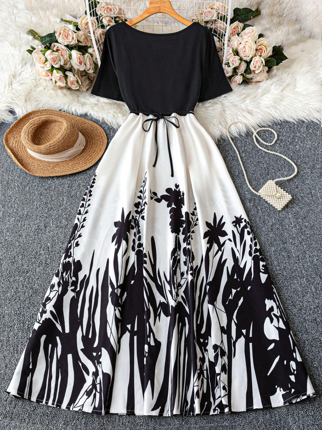 Step into summer with this playful plus size maxi dress featuring a vibrant floral print and adjustable tie straps. Its flowing silhouette offers comfort and style, perfect for holiday strolls or sunset dinners. Embrace effortless elegance and let your summer adventures bloom in this charming dress.