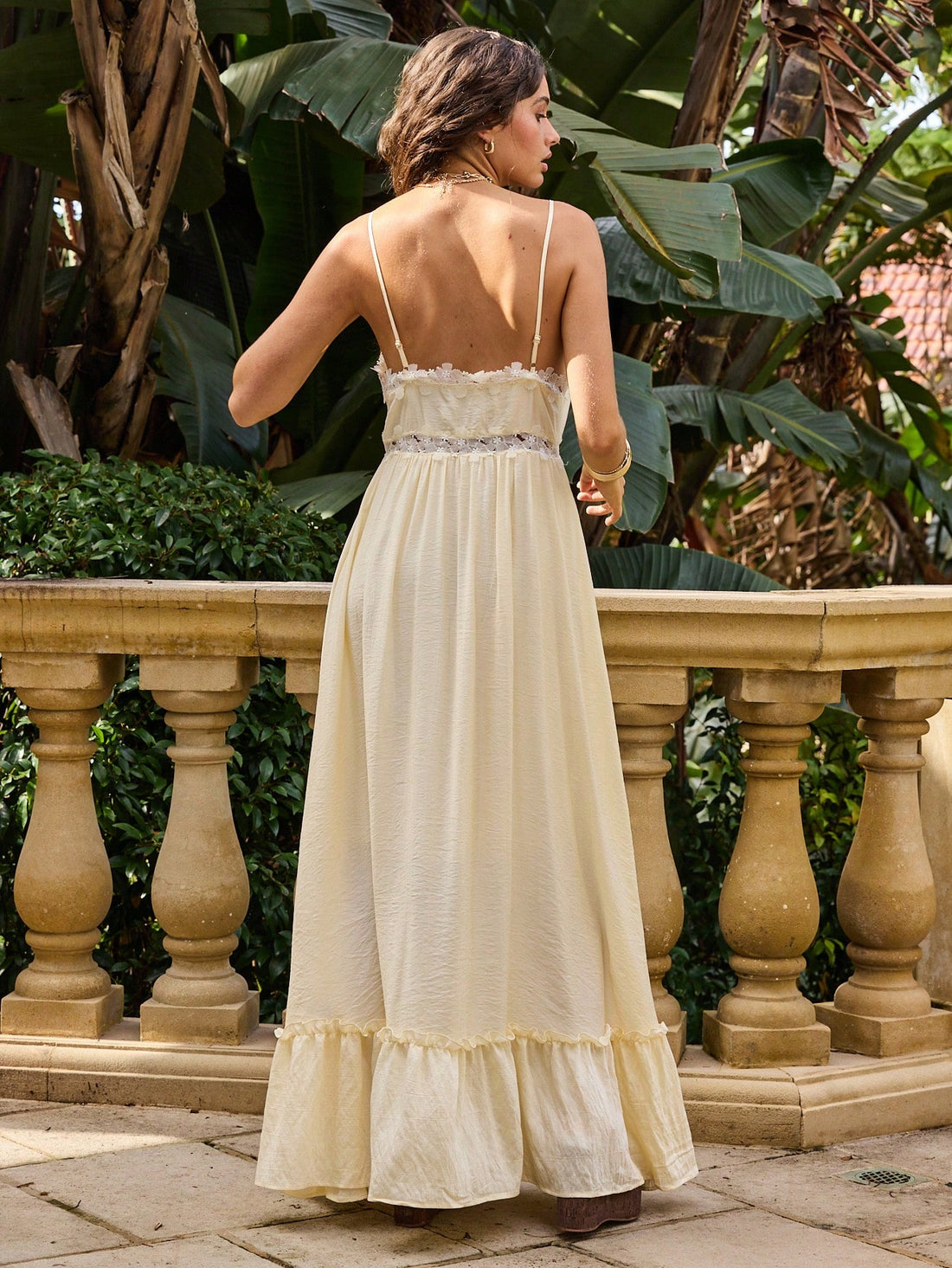 Embrace sunny days in this Elegant Flowy Maxi Dress, designed to keep you cool and effortless on your summer vacations. Delicate lace details add a romantic touch, while the flowing silhouette moves with every breeze. Whether you're beachside or strolling through town, this dress combines comfort and charm for your perfect getaway look.