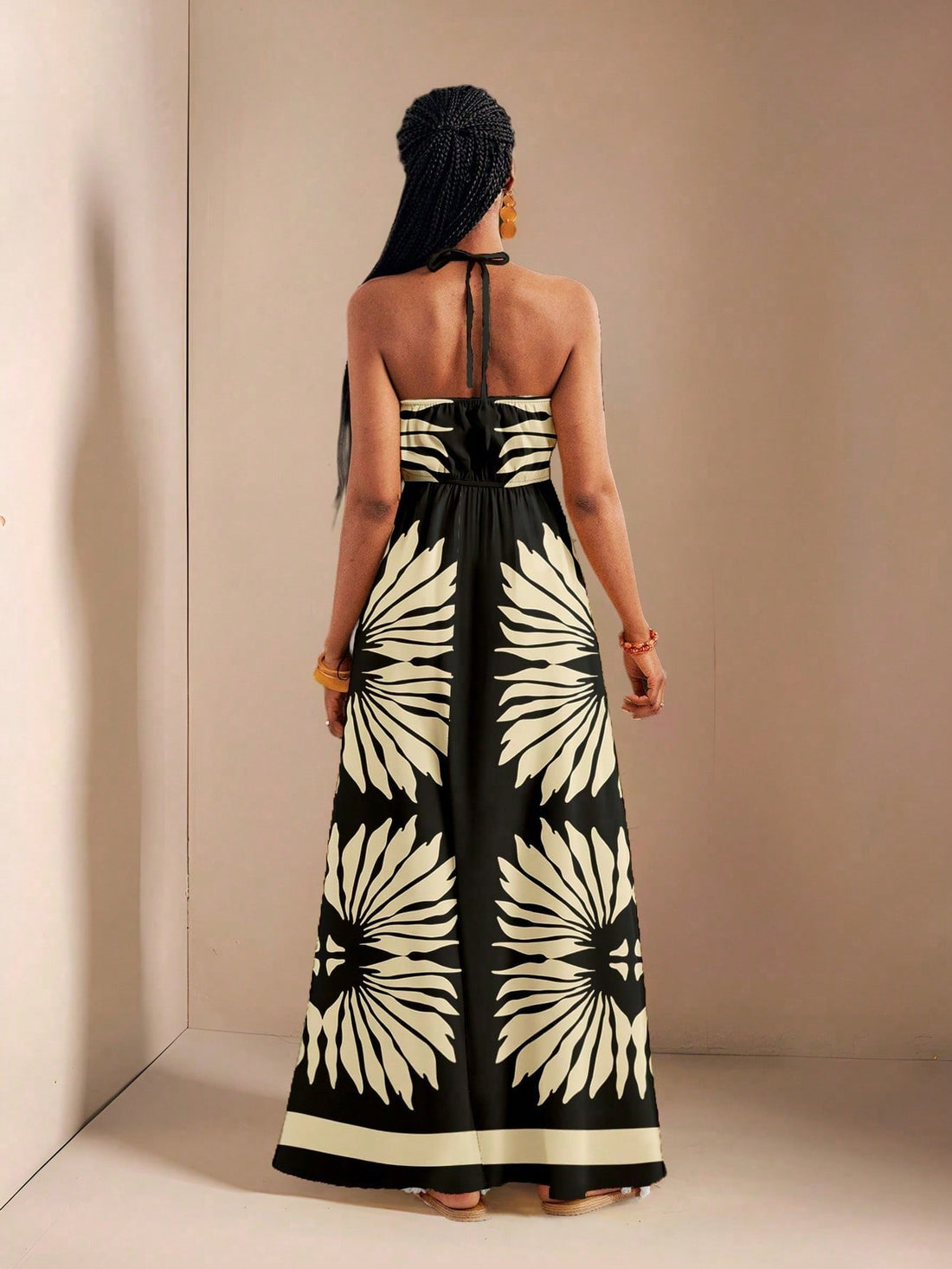 Embrace sunny vibes with the Easygoing Print Maxi! Featuring a playful drawstring V-neck, a flirty backless design, and a high slit, this dress keeps you cool and stylish on warm days. Perfect for beach strolls or casual outings, it’s your go-to for effortless summer fun.