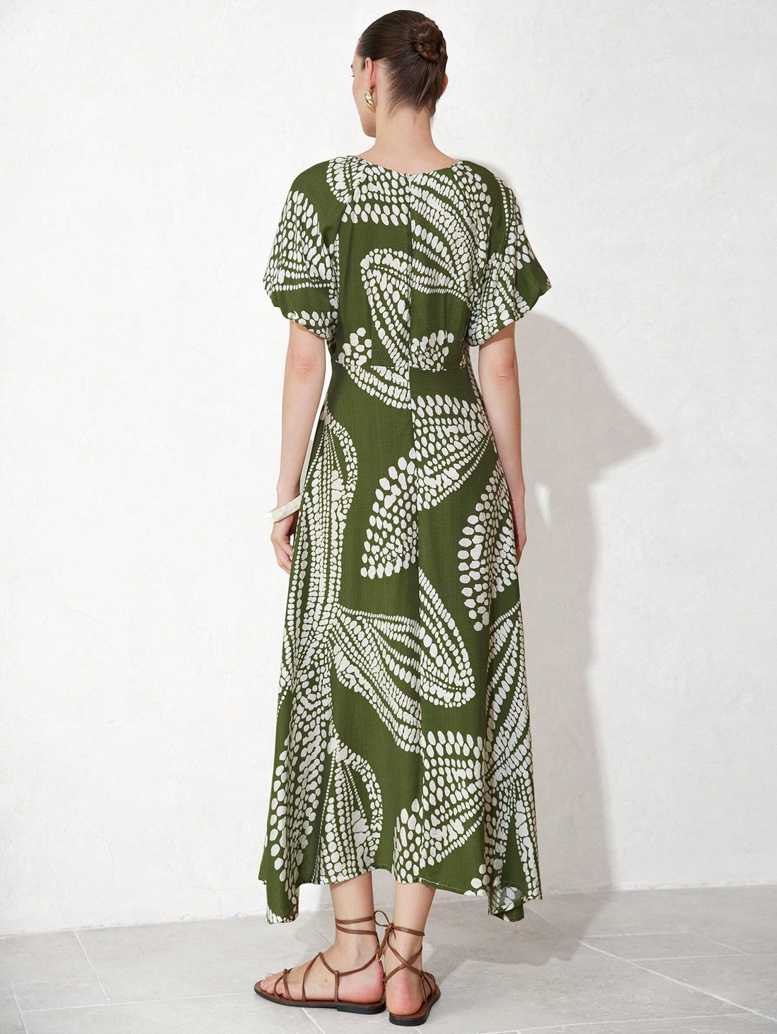 Step into sunny adventures with this playful green bamboo floral print dress. Its breezy A-line skirt and short sleeves keep you cool and comfortable, while the lively pattern adds a fresh, vacation-ready vibe. Perfect for strolling beachside or sipping cocktails by the pool, this dress lets you unwind in style with effortless charm.