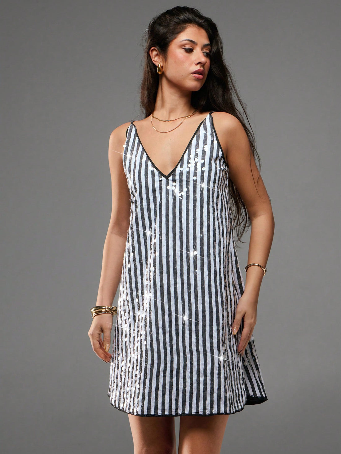 Step into summer with this playful and elegant mini dress designed for every occasion. Whether you're dancing at prom, strolling along the beach, or lighting up a party, this versatile dress combines comfort and style effortlessly. Its flattering cut and breezy fabric keep you cool and confident, making it your go-to choice for sunny days and lively nights. Embrace the season with a dress that’s as fun and vibrant as you are!