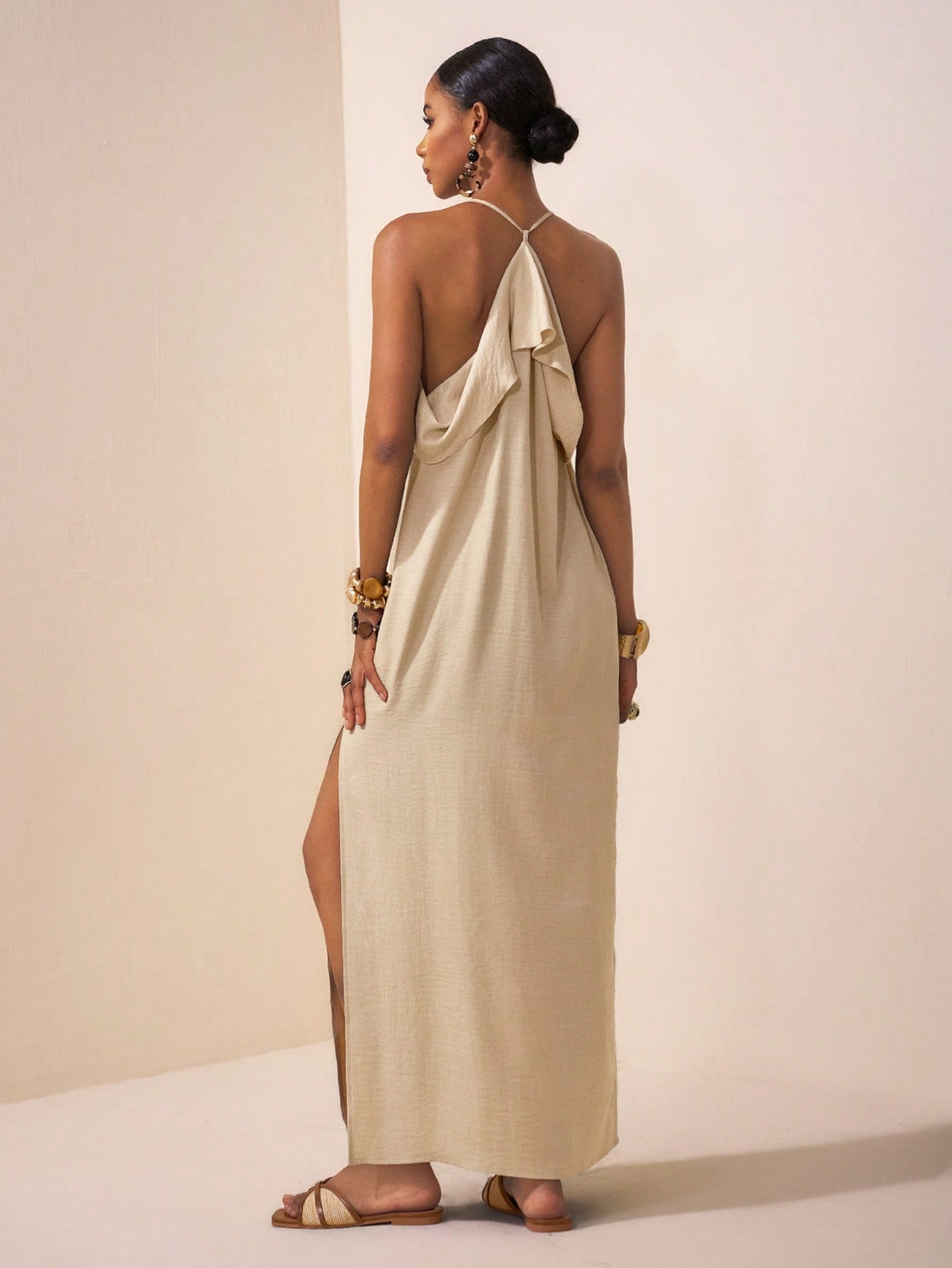Step into summer with the Trending Maxi in a dreamy apricot linen blend. This flowy dress is your go-to for weddings, brunch dates, or breezy airport style. Lightweight and effortlessly chic, it moves with you, keeping comfort and flair in perfect harmony. Whether you're celebrating or jet-setting, this dress adds a splash of sunshine to every moment.