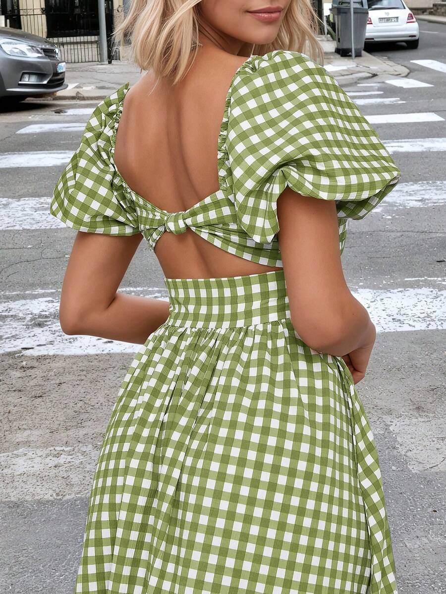 Front close view green white gingham smocked dress with puff sleeves and tiered ruffle skirt