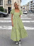 Full front view green white gingham midi dress with square neck, puff sleeves, and tiered skirt