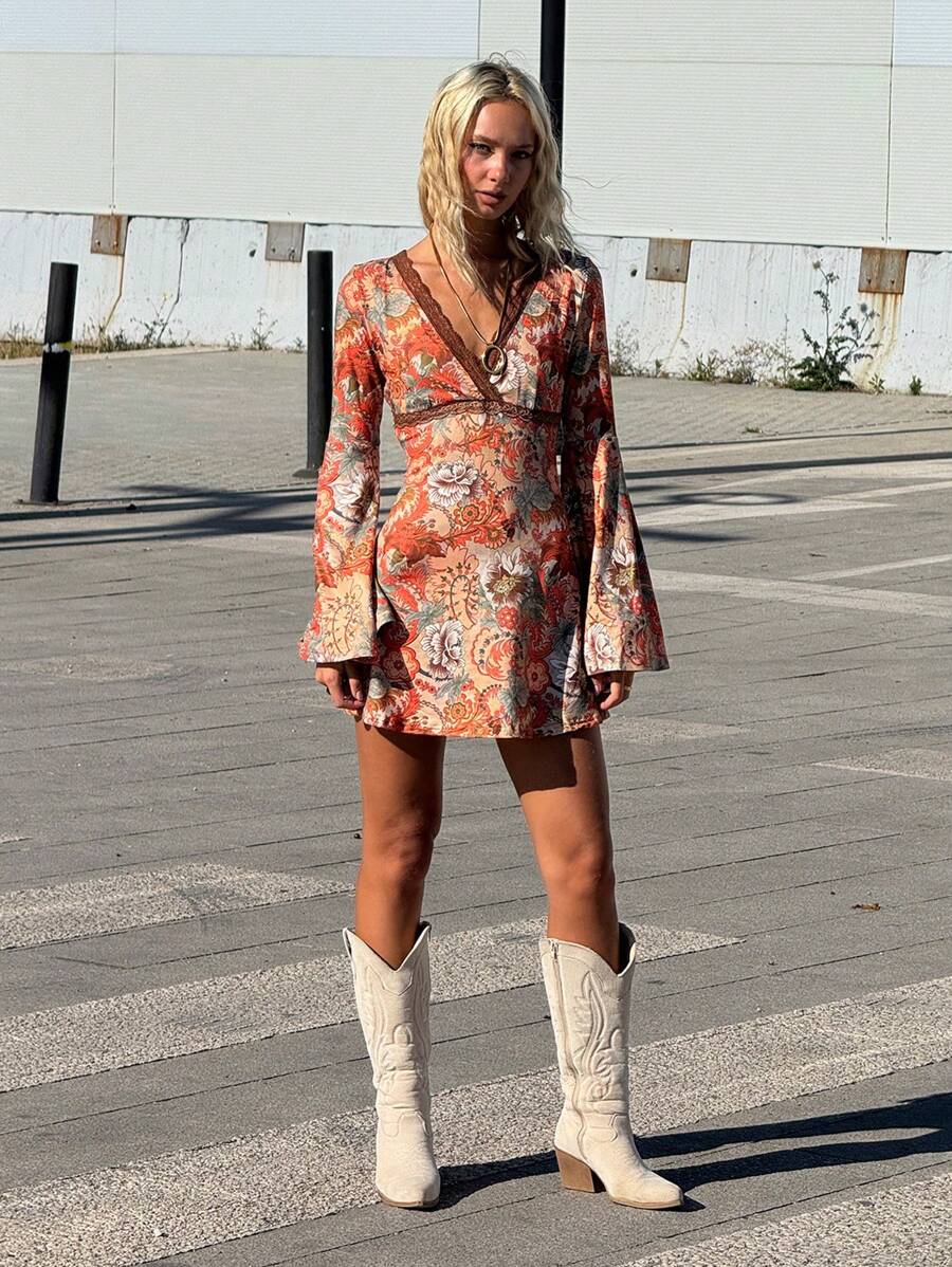 Full front view of multicolor floral faux-wrap mini dress with lace-trim high waist