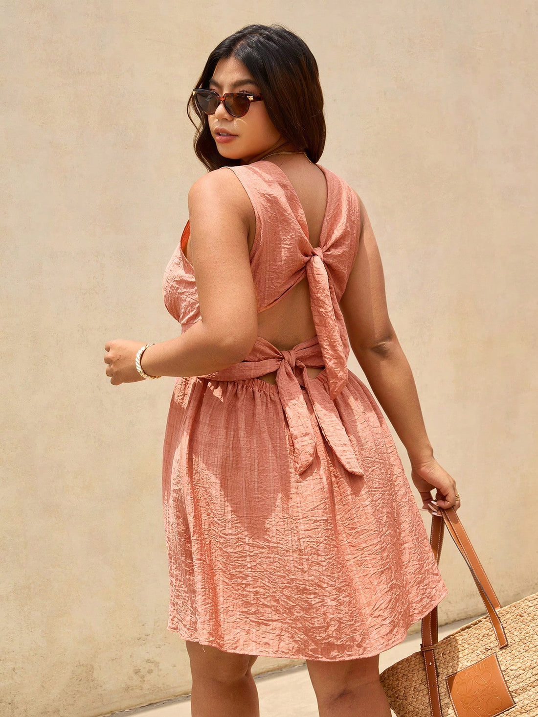 Step into vacation mode with this playful plus size A-line dress that’s all about effortless elegance. Its backless design keeps things breezy and flirty, perfect for sunny days and warm nights. The casual cut flatters your curves while offering freedom to move, making it your go-to for beach strolls or weekend escapes. Embrace relaxed vibes without sacrificing style!