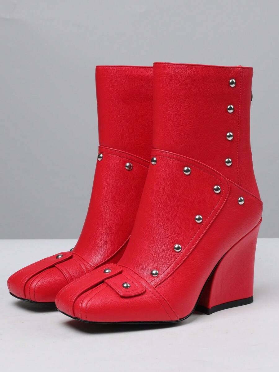 Step into fall with these chic women's ankle booties, featuring a trendy chunky heel and a stylish square toe. The convenient back zipper makes slipping them on a breeze, while their bold design adds a playful edge to any outfit. Perfect for turning heads and staying comfy all season long!