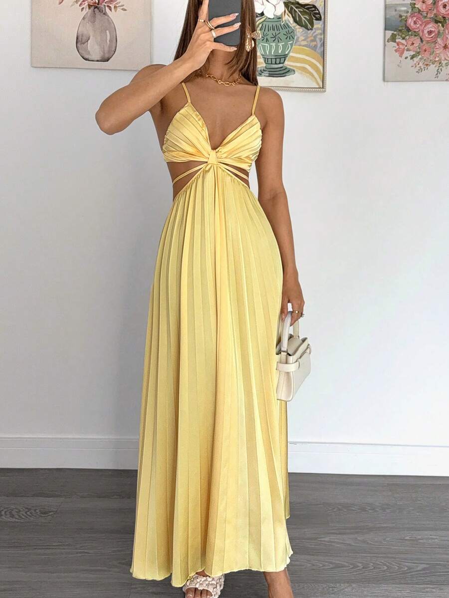 Radiate elegance in this stunning lemon yellow midi dress, designed to turn heads at any celebration. Featuring a flattering high-waisted silhouette with a daring waist cutout and delicate ruffle straps, this A-line beauty combines sophistication with modern flair. The halter neckline and backless design create an effortlessly chic look, while the flared hem adds graceful movement. Crafted from premium woven polyester, this sleeveless wonder transitions seamlessly from summer parties to formal evening event
