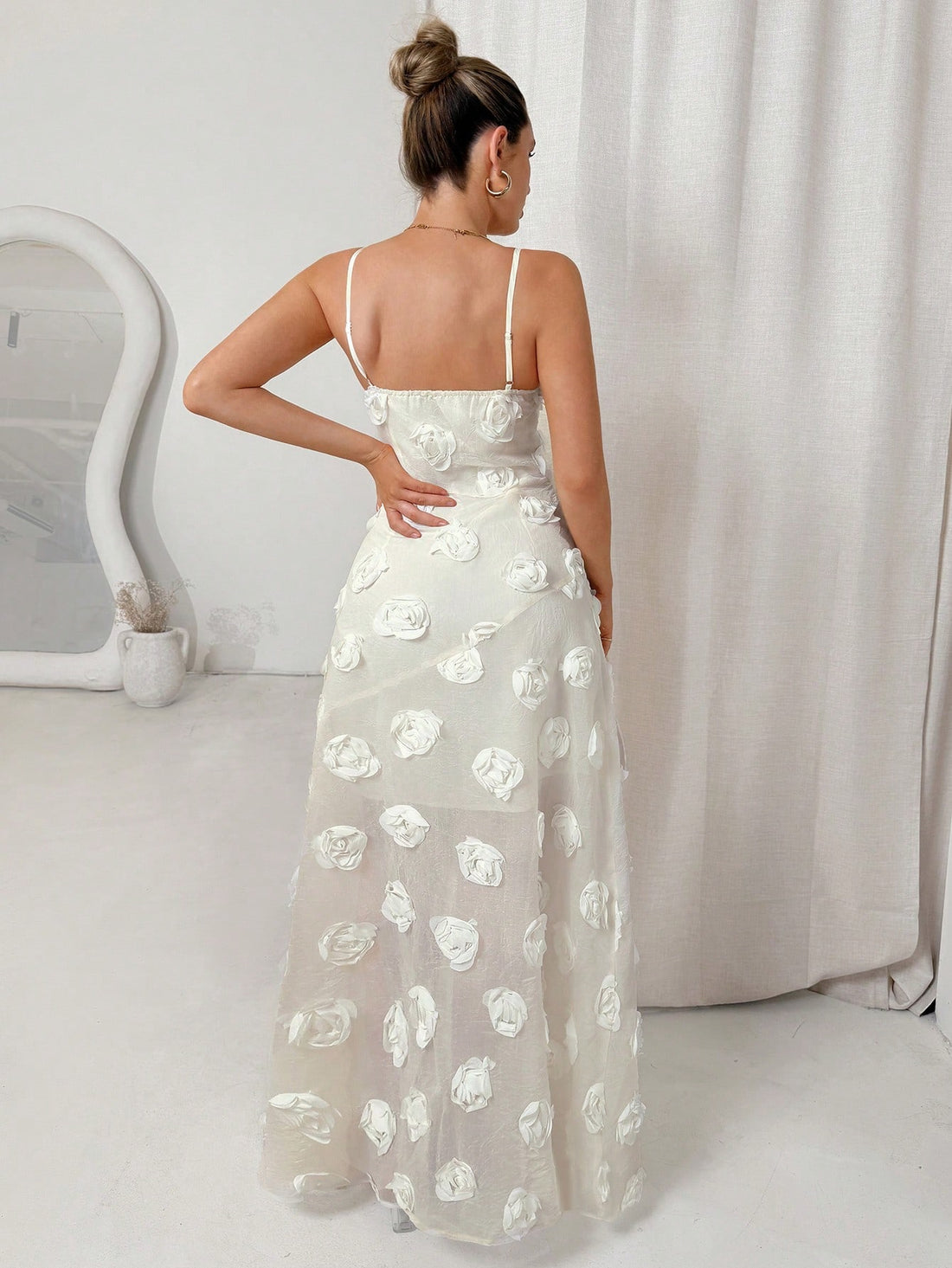 Step into sunshine and smiles with this Women's Floral 3D Flower Spaghetti Strap Dress. Its delicate 3D floral details add a whimsical touch, while the lightweight fabric and spaghetti straps keep you cool and carefree. Perfect for birthdays, beach days, or any vacation adventure, this dress brings a playful charm to your wardrobe that’s ready to celebrate every moment.