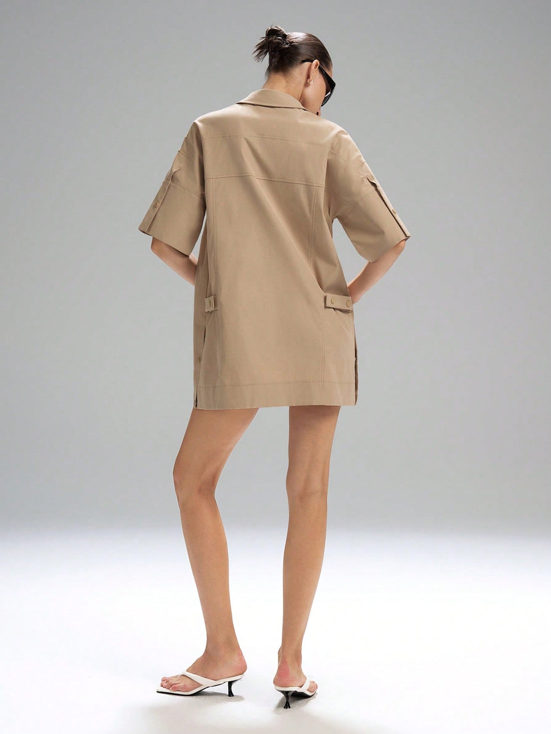 Step out in style with this Trendy Khaki Utility Pocket Mini Dress, your new go-to for effortless cool in 2025. Featuring handy pockets and a flattering mini cut, it’s perfect for those who love fashion with a functional twist. Whether you're out exploring or meeting friends, this dress keeps you looking sharp and feeling playful all day long.