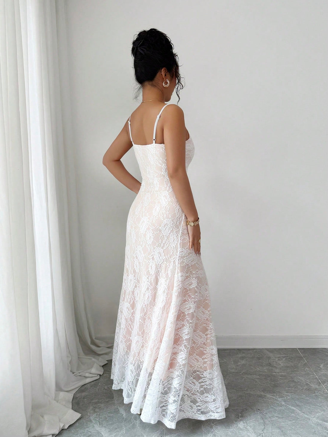 Step into sunshine and smiles with this Elegant Floral Lace Maxi Dress, designed just for summer days that feel like a dream. Its delicate spaghetti straps and flowing lace fabric create a carefree, breezy vibe that's perfect for garden parties or beachside strolls. Let the intricate floral details add a touch of charm while keeping you cool and comfortable all day long. Embrace effortless elegance with a playful twist in this must-have maxi dress!