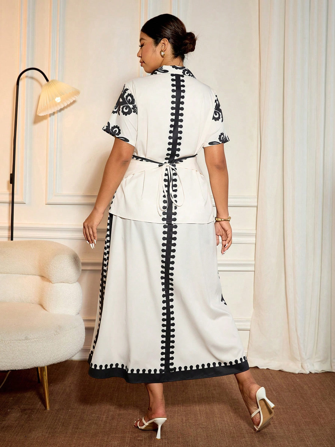 Step out in style with this playful plus size dress featuring a chic shirt collar and a lively print. The woven fabric offers comfort and breathability, while the belted waist adds a flattering shape. Short sleeves keep it cool and casual, perfect for bright days or fun nights. Embrace elegance with a twist—this dress is ready to make your wardrobe pop!