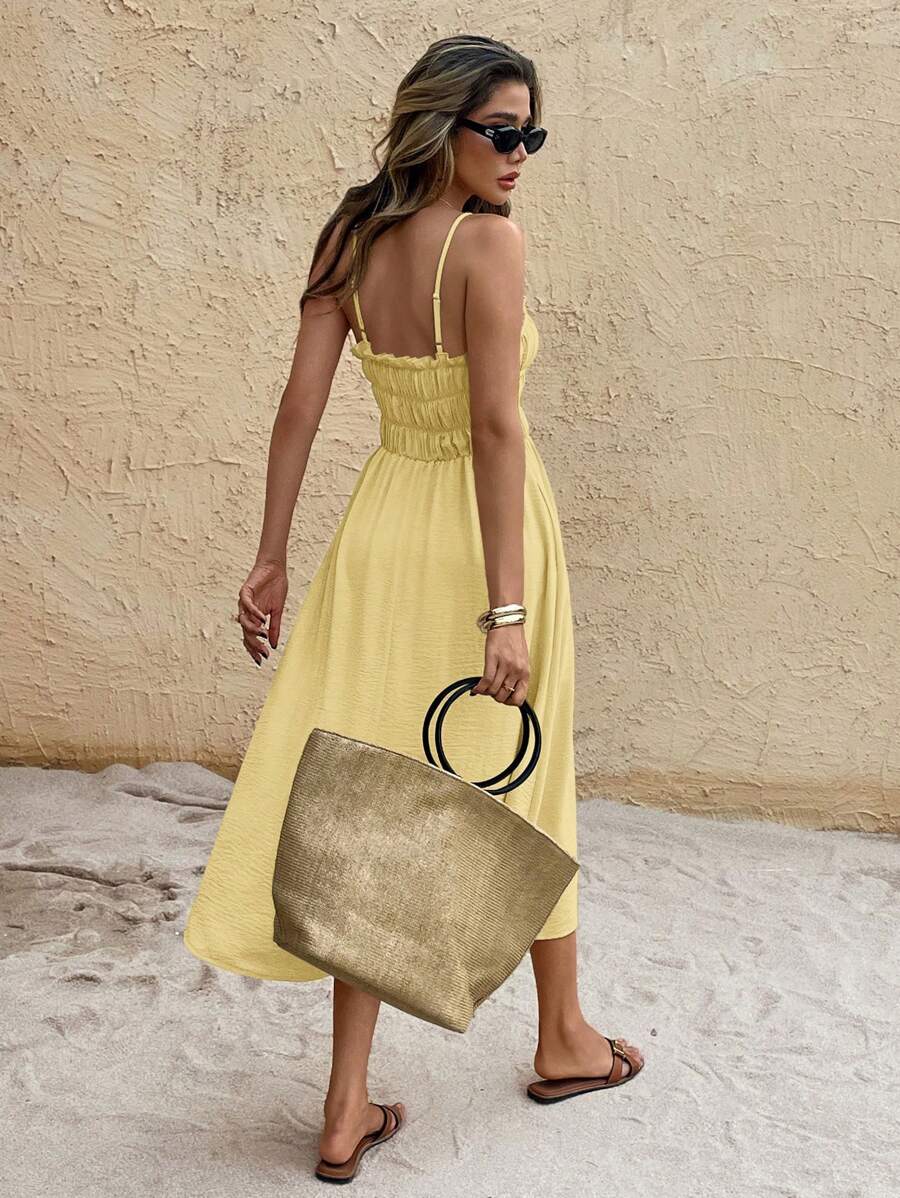 Back view pale yellow ruched bust midi sundress with smocked back and thin straps