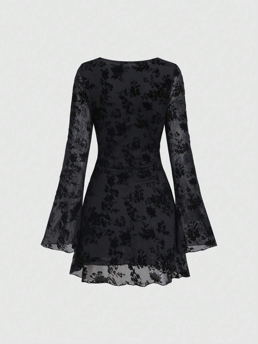 Step into timeless charm with this Elegant Vintage Mesh Flocked Long Sleeve Fitted Mini Dress. Its delicate mesh and flocked details add a touch of whimsy, while the fitted silhouette flatters your curves perfectly. Long sleeves keep it classy, and the mini length brings a flirty edge—ideal for turning heads at any event. Dress up your playful side with vintage-inspired elegance!