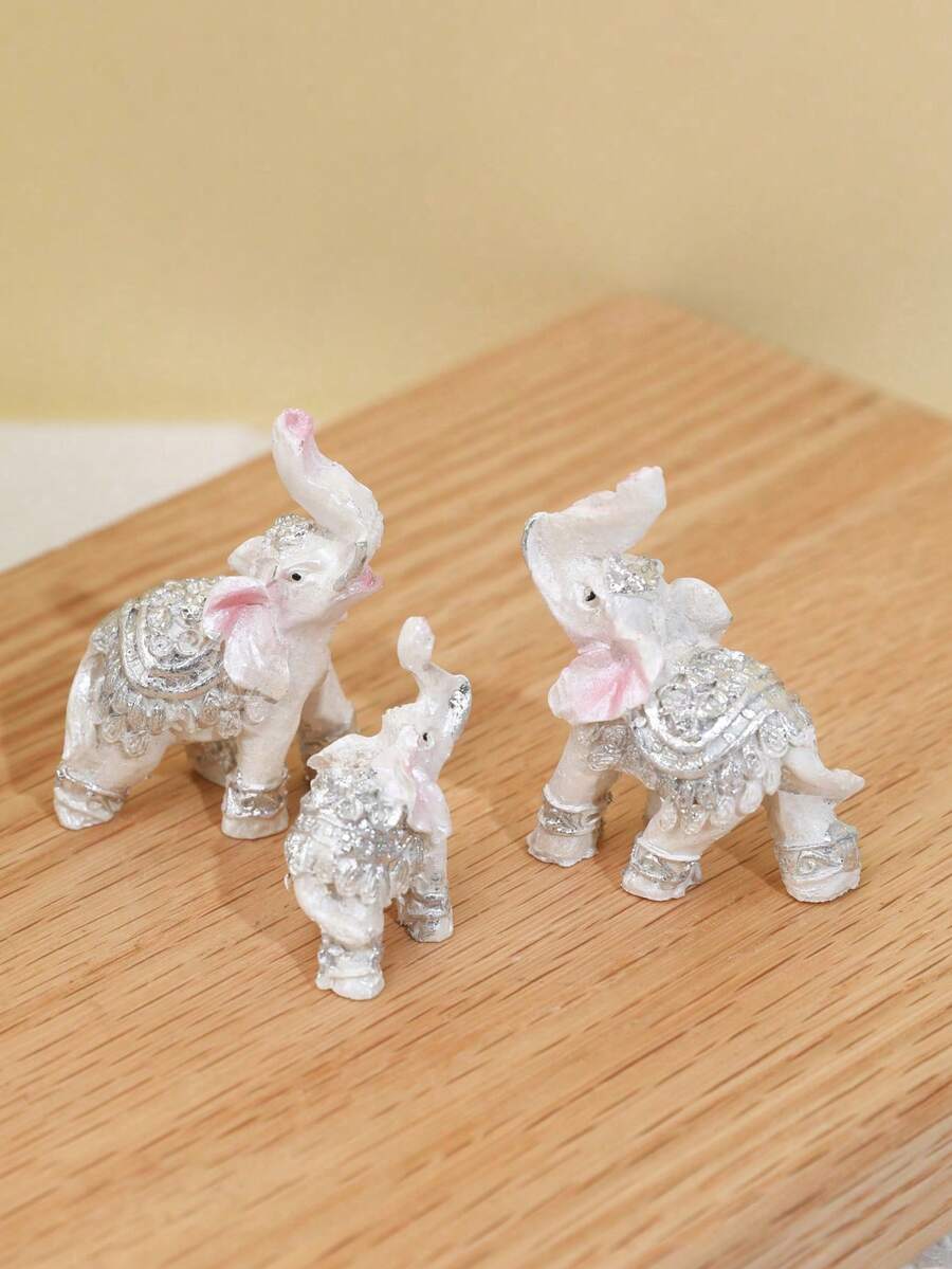 Holiday display styling with mini elephant decor set