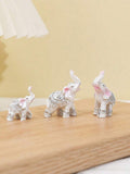 Final angle of mini elephant figurine set for home accents