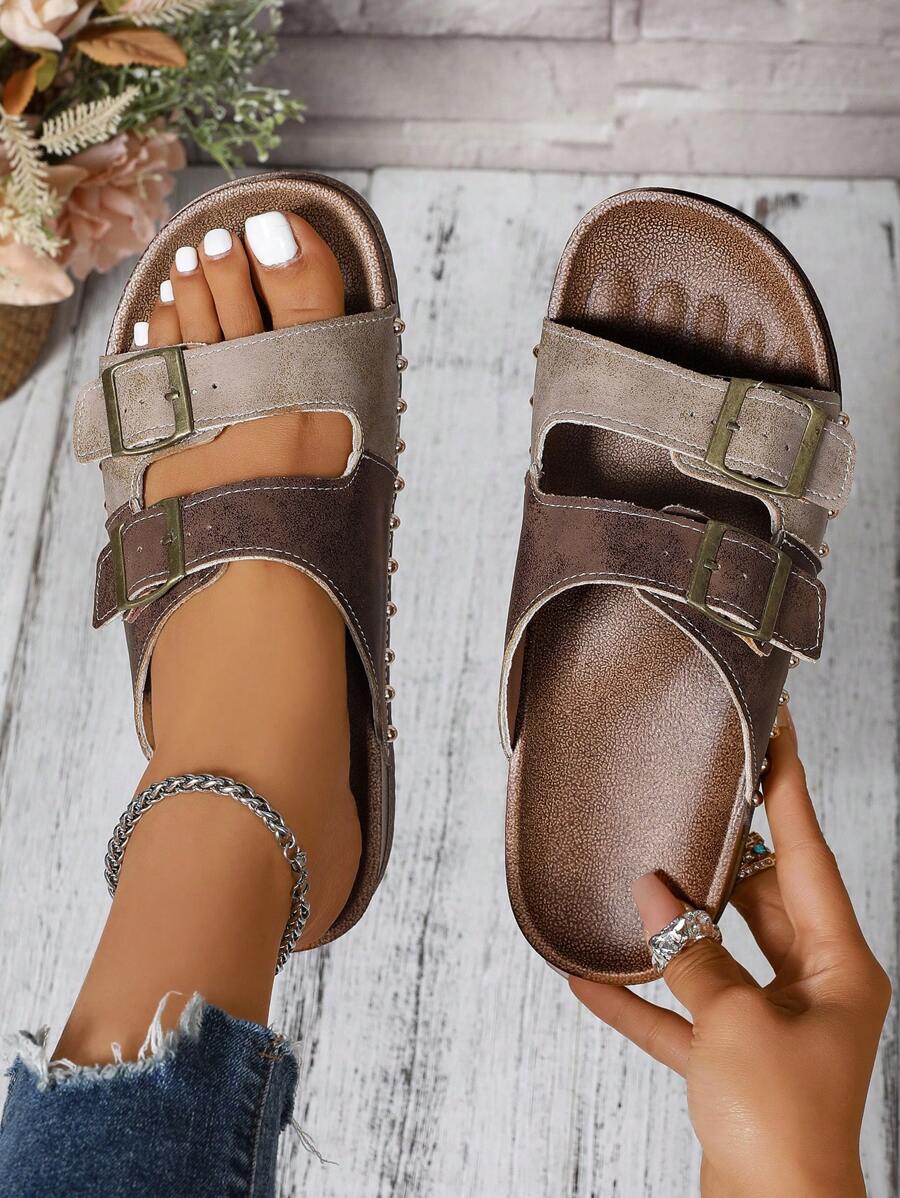 Step into comfort with a splash of style! These slip-on slippers feature an adjustable buckle for the perfect fit and eye-catching color block design that adds a trendy twist to your casual look. Ideal for both teens and adults, they make lounging or quick errands effortlessly cool and comfy.