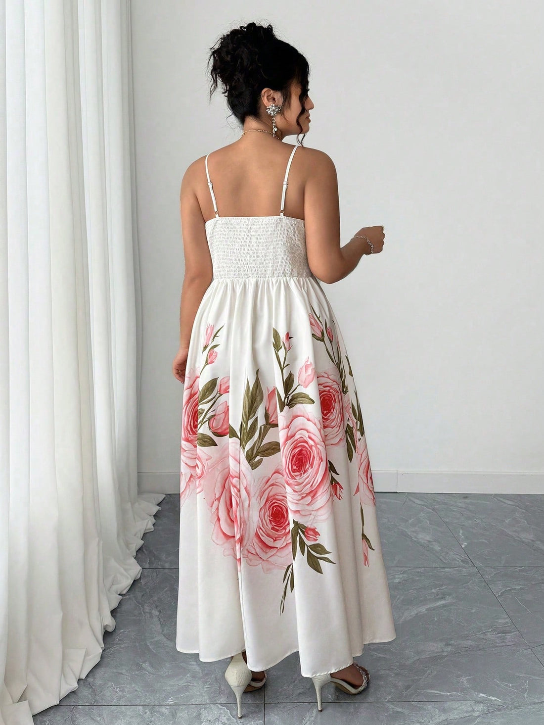 Step into effortless charm with this elegant plus size sleeveless long dress, adorned with a delightful rose floral print. Perfect for casual outings or holiday escapes, its flowing design offers comfort and style all day long. Embrace your curves and bloom beautifully wherever you go!