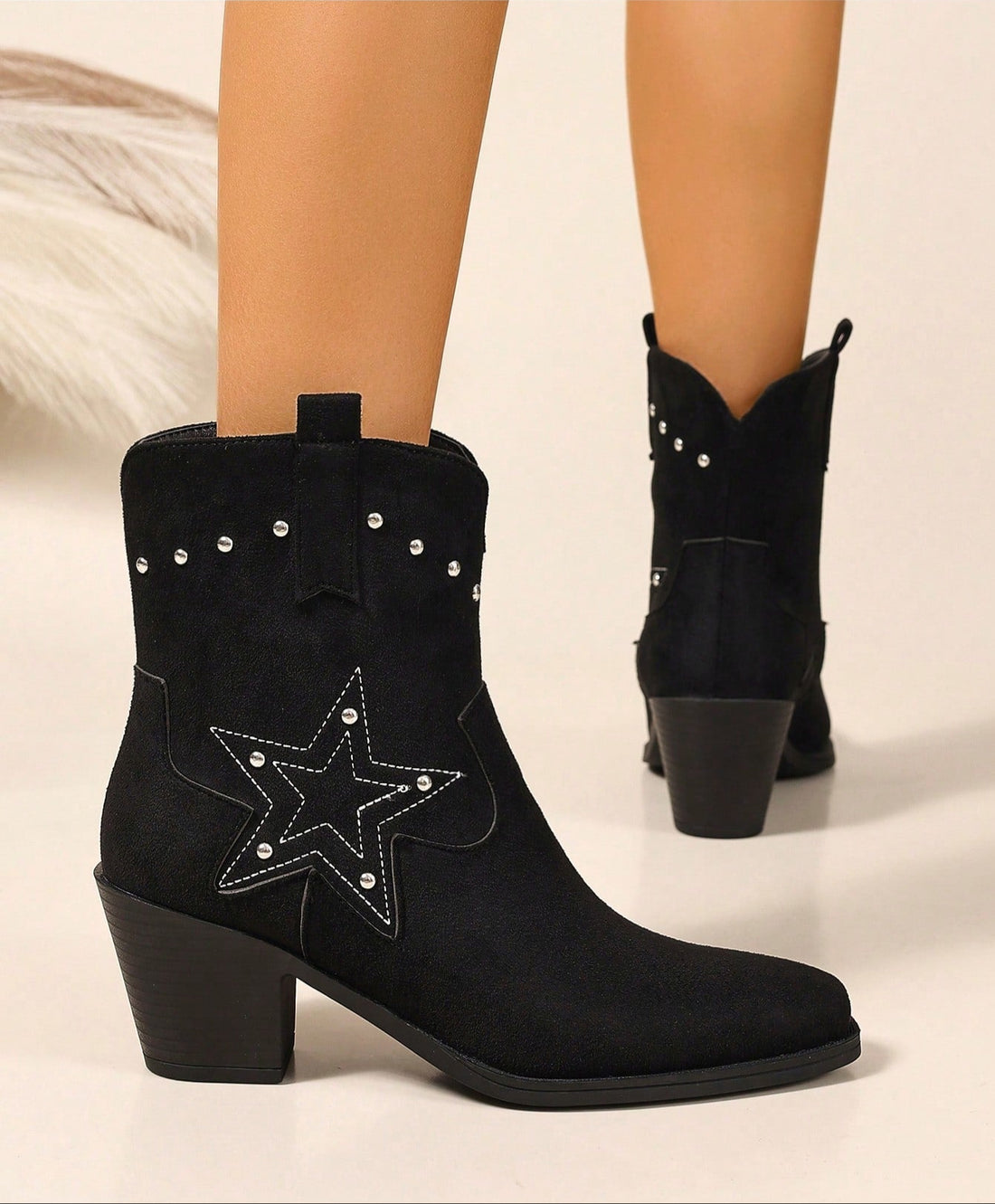 Step out in style with these Elegant Black Embroidered Chunky Heel Chelsea Boots. Perfect for vacation adventures, their bold chunky heel adds confidence while the intricate embroidery brings a touch of playful charm. Easy to slip on and versatile enough to pair with any outfit, these boots are your go-to for turning heads wherever you roam.