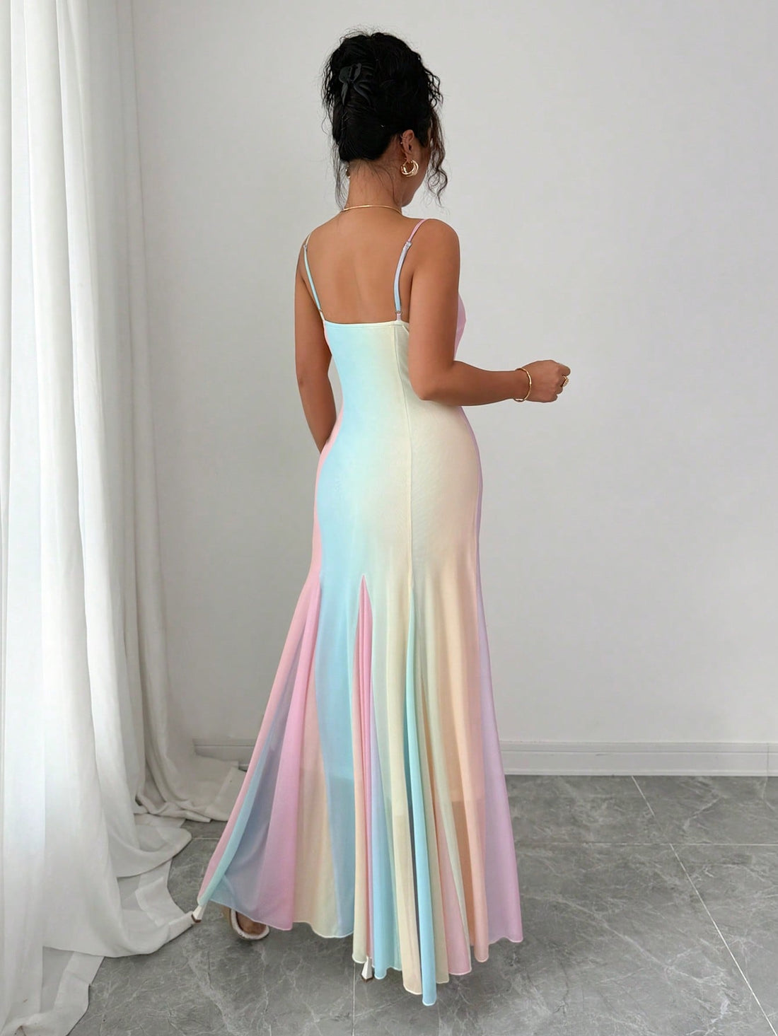 Step into sunshine with the Rafferiza Rainbow Chiffon Vacation Dress! Light and airy, its colorful chiffon fabric and delicate spaghetti straps make every summer day feel like a breeze. Perfect for beach strolls or evening adventures, this dress adds a splash of joy to your vacation wardrobe while keeping you cool and carefree.